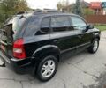 Хендай Туксон 2005 у Хороле на Automoto.ua Чорний Хендай Туксон, об'ємом двигуна 2 л та пробігом 163 тис. км за 7700 $, фото 3 на Automoto.ua