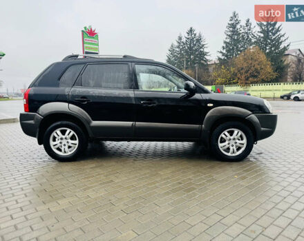 Черный Хендай Туксон, объемом двигателя 1.98 л и пробегом 252 тыс. км за 7300 $, фото 3 на Automoto.ua