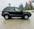 Черный Хендай Туксон, объемом двигателя 1.98 л и пробегом 252 тыс. км за 7300 $, фото 3 на Automoto.ua
