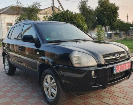 Черный Хендай Туксон, объемом двигателя 2 л и пробегом 137 тыс. км за 7499 $, фото 4 на Automoto.ua