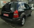 Черный Хендай Туксон, объемом двигателя 2 л и пробегом 252 тыс. км за 7300 $, фото 6 на Automoto.ua