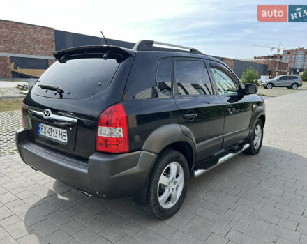 Черный Хендай Туксон, объемом двигателя 2 л и пробегом 255 тыс. км за 6900 $, фото 5 на Automoto.ua