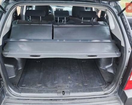 Черный Хендай Туксон, объемом двигателя 2 л и пробегом 284 тыс. км за 4700 $, фото 11 на Automoto.ua