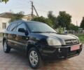 Черный Хендай Туксон, объемом двигателя 1.98 л и пробегом 137 тыс. км за 7599 $, фото 1 на Automoto.ua
