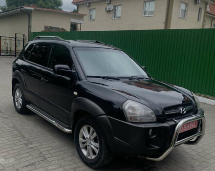 Черный Хендай Туксон, объемом двигателя 2 л и пробегом 270 тыс. км за 6300 $, фото 1 на Automoto.ua