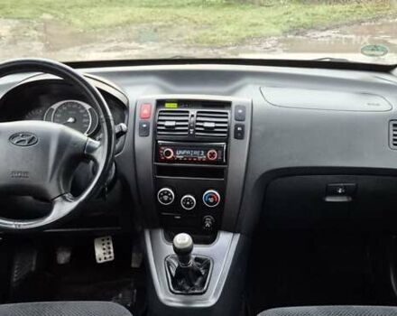 Черный Хендай Туксон, объемом двигателя 1.98 л и пробегом 230 тыс. км за 6390 $, фото 15 на Automoto.ua