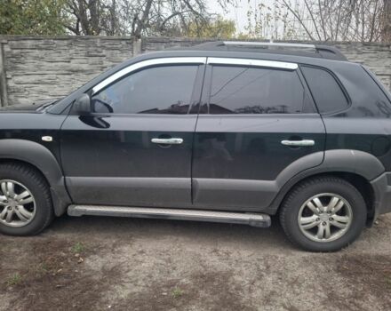 Черный Хендай Туксон, объемом двигателя 2 л и пробегом 224 тыс. км за 6800 $, фото 7 на Automoto.ua