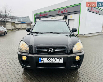 Черный Хендай Туксон, объемом двигателя 1.98 л и пробегом 252 тыс. км за 7300 $, фото 1 на Automoto.ua