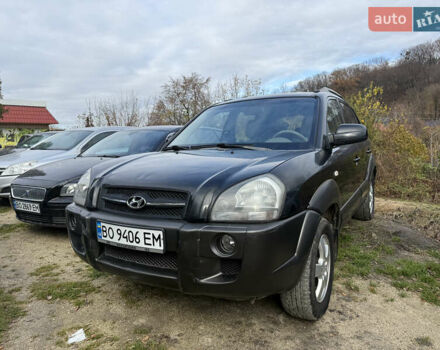 Черный Хендай Туксон, объемом двигателя 2 л и пробегом 211 тыс. км за 4444 $, фото 1 на Automoto.ua
