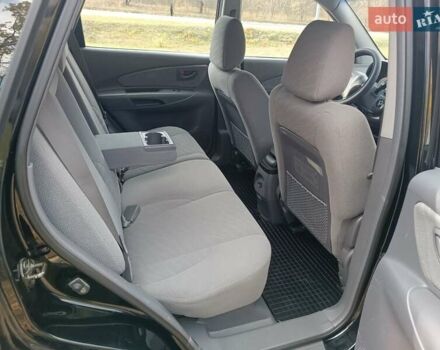 Черный Хендай Туксон, объемом двигателя 1.98 л и пробегом 192 тыс. км за 6900 $, фото 13 на Automoto.ua