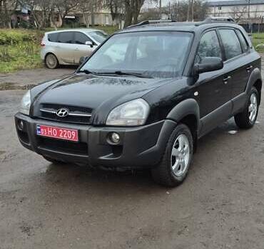 Черный Хендай Туксон, объемом двигателя 1.98 л и пробегом 230 тыс. км за 6390 $, фото 3 на Automoto.ua