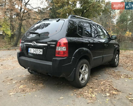 Черный Хендай Туксон, объемом двигателя 2 л и пробегом 261 тыс. км за 6500 $, фото 6 на Automoto.ua
