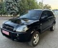 Хендай Туксон 2005 у Вознесенске на Automoto.ua Чорний Хендай Туксон, об'ємом двигуна 1.98 л та пробігом 144 тис. км за 7500 $, фото 1 на Automoto.ua