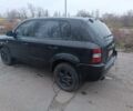 Черный Хендай Туксон, объемом двигателя 2 л и пробегом 293 тыс. км за 4300 $, фото 2 на Automoto.ua