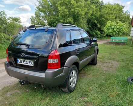 Черный Хендай Туксон, объемом двигателя 2 л и пробегом 238 тыс. км за 8200 $, фото 3 на Automoto.ua