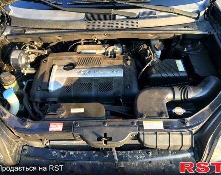 Хендай Туксон 2005 в Первомайском на Automoto.ua Черный Хендай Туксон, объемом двигателя 2 л и пробегом 253 тыс. км за 7700 $, фото 9 на Automoto.ua