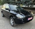 Хендай Туксон 2005 у Вознесенске на Automoto.ua Чорний Хендай Туксон, об'ємом двигуна 1.98 л та пробігом 144 тис. км за 7500 $, фото 9 на Automoto.ua