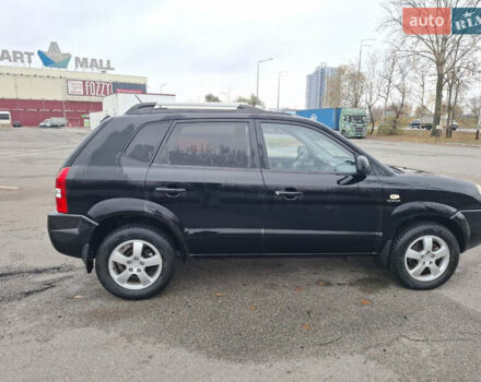 Черный Хендай Туксон, объемом двигателя 2 л и пробегом 170 тыс. км за 6999 $, фото 6 на Automoto.ua