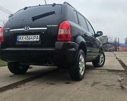 Черный Хендай Туксон, объемом двигателя 2 л и пробегом 190 тыс. км за 7500 $, фото 21 на Automoto.ua