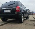 Черный Хендай Туксон, объемом двигателя 2 л и пробегом 190 тыс. км за 7500 $, фото 21 на Automoto.ua