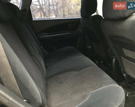 Черный Хендай Туксон, объемом двигателя 2 л и пробегом 261 тыс. км за 6500 $, фото 21 на Automoto.ua