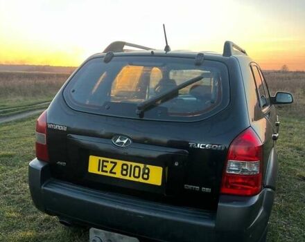 Черный Хендай Туксон, объемом двигателя 1.98 л и пробегом 135 тыс. км за 3950 $, фото 7 на Automoto.ua