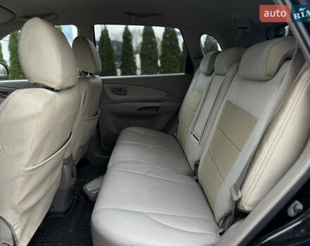 Черный Хендай Туксон, объемом двигателя 2.7 л и пробегом 220 тыс. км за 6350 $, фото 9 на Automoto.ua