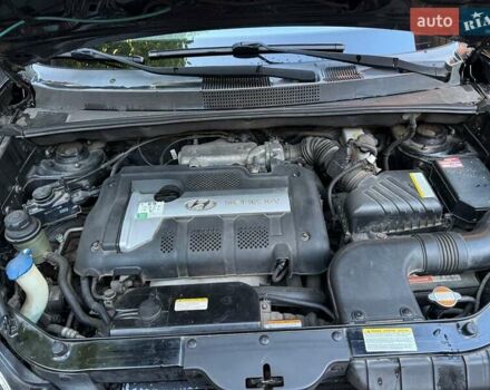 Чорний Хендай Туксон, об'ємом двигуна 1.98 л та пробігом 137 тис. км за 7600 $, фото 12 на Automoto.ua