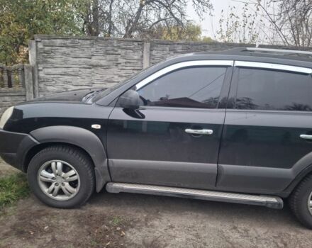 Черный Хендай Туксон, объемом двигателя 2 л и пробегом 224 тыс. км за 6800 $, фото 2 на Automoto.ua