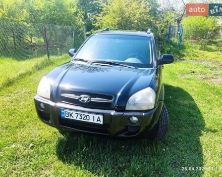 Чорний Хендай Туксон, об'ємом двигуна 2 л та пробігом 267 тис. км за 7300 $, фото 19 на Automoto.ua