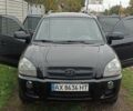 Чорний Хендай Туксон, об'ємом двигуна 1.98 л та пробігом 146 тис. км за 8200 $, фото 5 на Automoto.ua