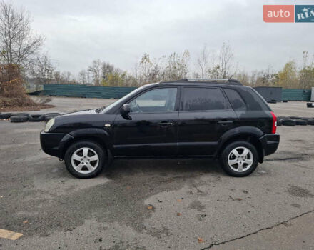 Черный Хендай Туксон, объемом двигателя 2 л и пробегом 170 тыс. км за 6999 $, фото 1 на Automoto.ua
