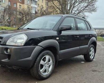 Черный Хендай Туксон, объемом двигателя 1.98 л и пробегом 230 тыс. км за 6390 $, фото 32 на Automoto.ua