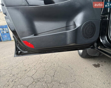 Черный Хендай Туксон, объемом двигателя 1.98 л и пробегом 215 тыс. км за 8600 $, фото 13 на Automoto.ua