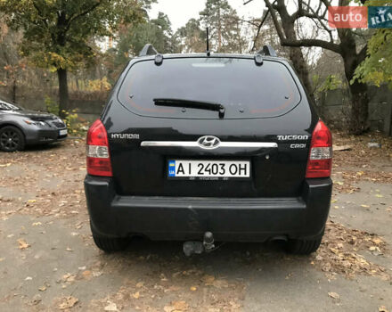 Черный Хендай Туксон, объемом двигателя 2 л и пробегом 261 тыс. км за 6500 $, фото 7 на Automoto.ua