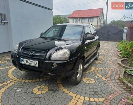 Чорний Хендай Туксон, об'ємом двигуна 1.98 л та пробігом 237 тис. км за 7500 $, фото 1 на Automoto.ua