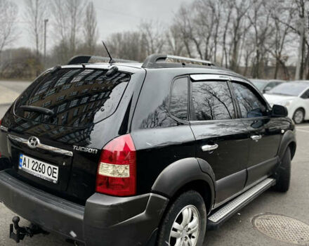 Чорний Хендай Туксон, об'ємом двигуна 1.98 л та пробігом 225 тис. км за 6600 $, фото 8 на Automoto.ua