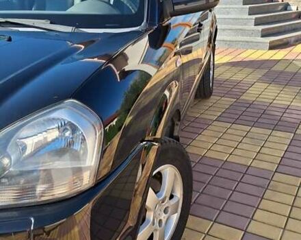 Чорний Хендай Туксон, об'ємом двигуна 1.98 л та пробігом 229 тис. км за 7400 $, фото 4 на Automoto.ua