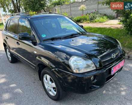 Черный Хендай Туксон, объемом двигателя 2 л и пробегом 207 тыс. км за 7300 $, фото 1 на Automoto.ua