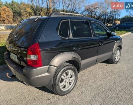 Черный Хендай Туксон, объемом двигателя 1.98 л и пробегом 226 тыс. км за 6500 $, фото 8 на Automoto.ua