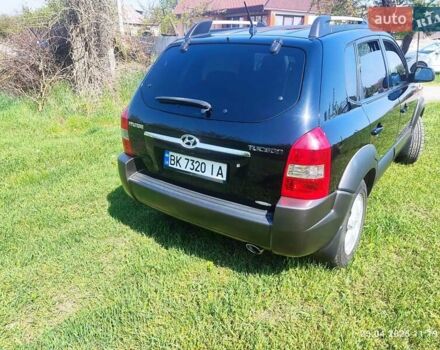 Чорний Хендай Туксон, об'ємом двигуна 2 л та пробігом 267 тис. км за 7300 $, фото 15 на Automoto.ua