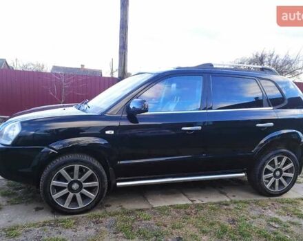 Черный Хендай Туксон, объемом двигателя 2 л и пробегом 208 тыс. км за 6950 $, фото 31 на Automoto.ua