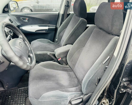 Черный Хендай Туксон, объемом двигателя 1.98 л и пробегом 252 тыс. км за 7300 $, фото 17 на Automoto.ua