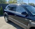 Чорний Хендай Туксон, об'ємом двигуна 2 л та пробігом 235 тис. км за 8100 $, фото 3 на Automoto.ua