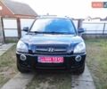 Черный Хендай Туксон, объемом двигателя 2 л и пробегом 208 тыс. км за 6950 $, фото 1 на Automoto.ua