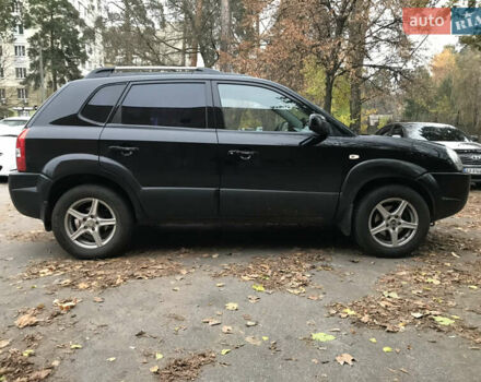 Черный Хендай Туксон, объемом двигателя 2 л и пробегом 261 тыс. км за 6500 $, фото 4 на Automoto.ua