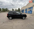Черный Хендай Туксон, объемом двигателя 1.98 л и пробегом 215 тыс. км за 8600 $, фото 4 на Automoto.ua