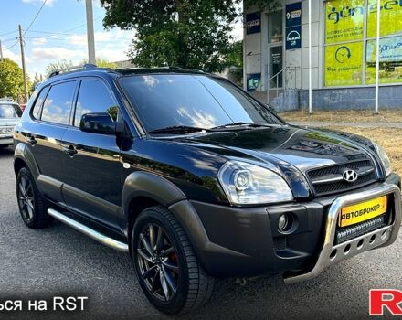 Черный Хендай Туксон, объемом двигателя 2 л и пробегом 241 тыс. км за 7800 $, фото 1 на Automoto.ua