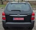 Черный Хендай Туксон, объемом двигателя 1.98 л и пробегом 230 тыс. км за 6390 $, фото 6 на Automoto.ua