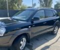 Чорний Хендай Туксон, об'ємом двигуна 2 л та пробігом 235 тис. км за 8100 $, фото 5 на Automoto.ua